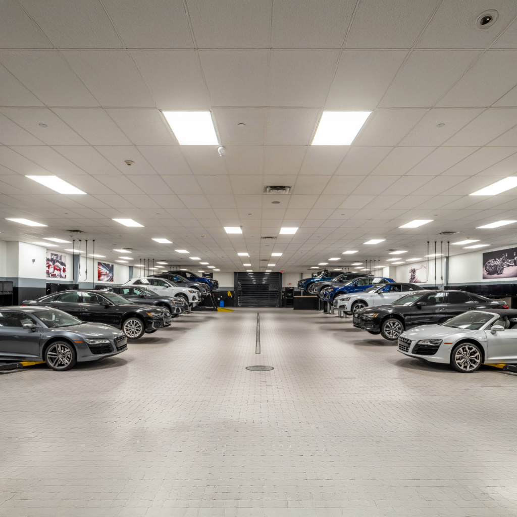 Front profile view of an Audi Q5 vehicle being serviced.